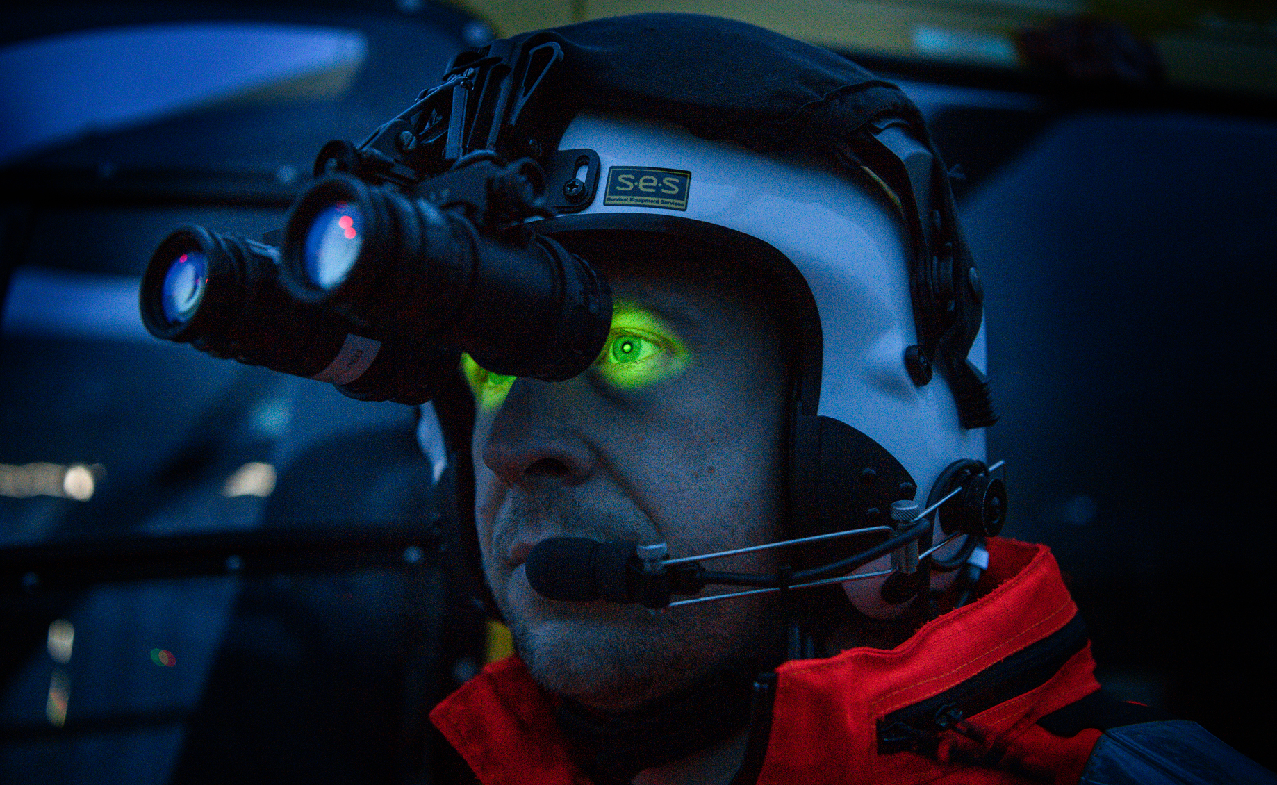 A paramedic wearing night vision goggles