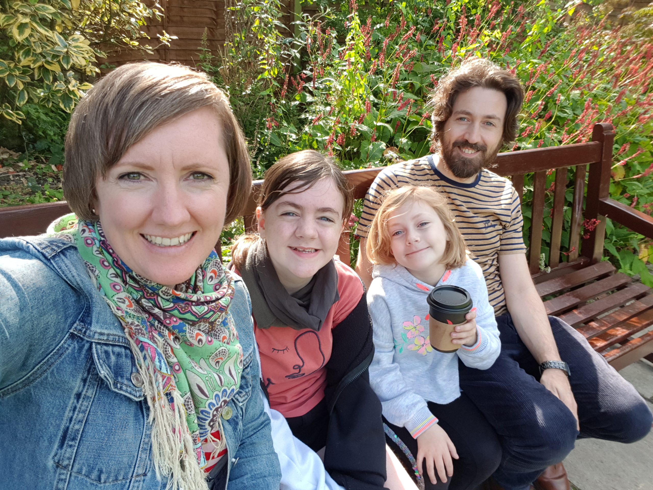 A family sat on a bench