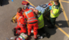 A team of paramedics working on a patient in a training simulation