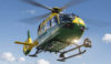 Our helicopter, Helimed 56, is in flight. The sky is blue and the search light underneath is on.